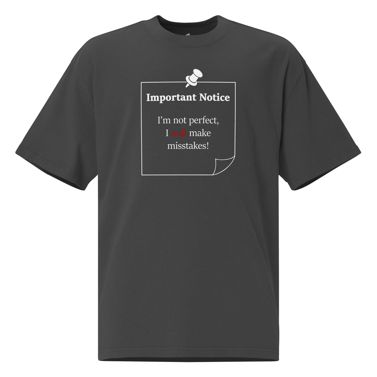 A unisex oversized cotton faded black t-shirt featuring a printed white outlined square note and a white pushpin at the top centre. The note displays the slogan: ‘Important Notice: I’m not perfect, I will make misstakes.’ in black, with the word will highlighted in bold red for emphasis
