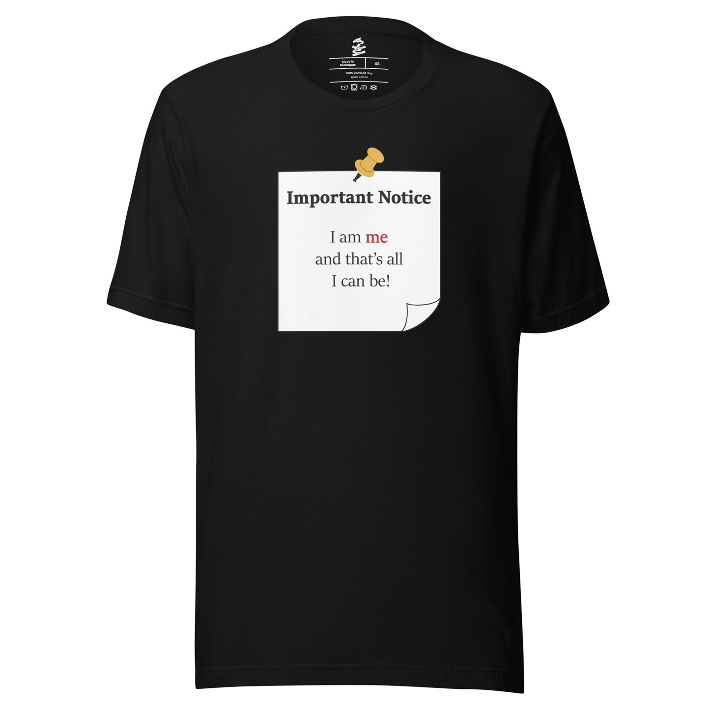 A unisex classic cotton black t-shirt featuring a printed black-outlined square note with a white background and a yellow pushpin at the top centre. The note displays the slogan: "Important notice: I am me that's all I can be" in black, with the word me highlighted in bold red for emphasis.