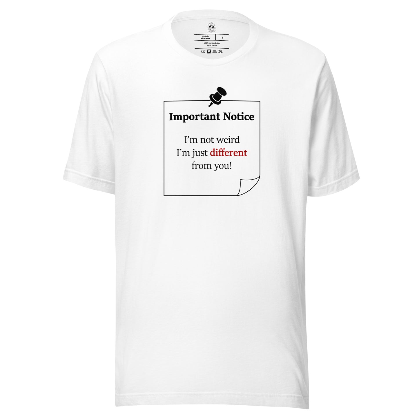 A unisex athletic-heather grey classic cotton t-shirt featuring a printed black outlined square note and a black pushpin at the top centre. The note displays the slogan: "Important notice: I’m not weird i'm just different from you in black, with the word different highlighted in bold red for emphasis.