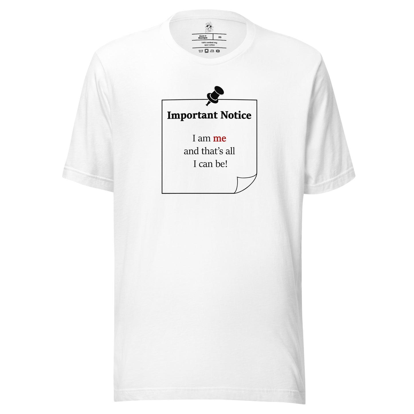 A unisex white classic cotton t-shirt featuring a printed black-outlined square note and a black pushpin at the top centre. The note displays the slogan: "Important notice: I am me and that's all I can be" in black, with the word me highlighted in bold red for emphasis.