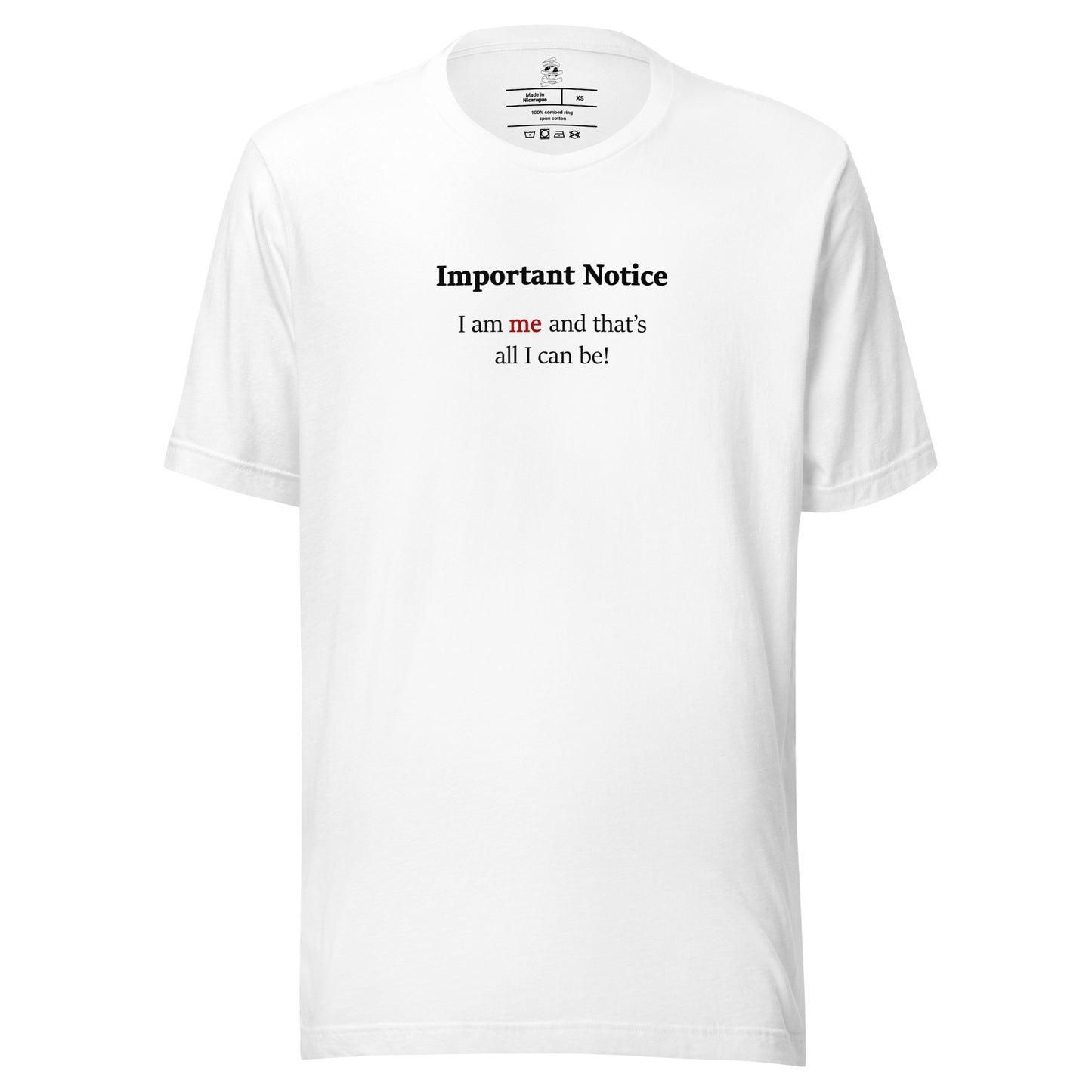 White unisex motivational slogan T-shirt design featuring a pushpin note graphic with the quote “I am me and that is all I can be,” with the word “me” highlighted in red.