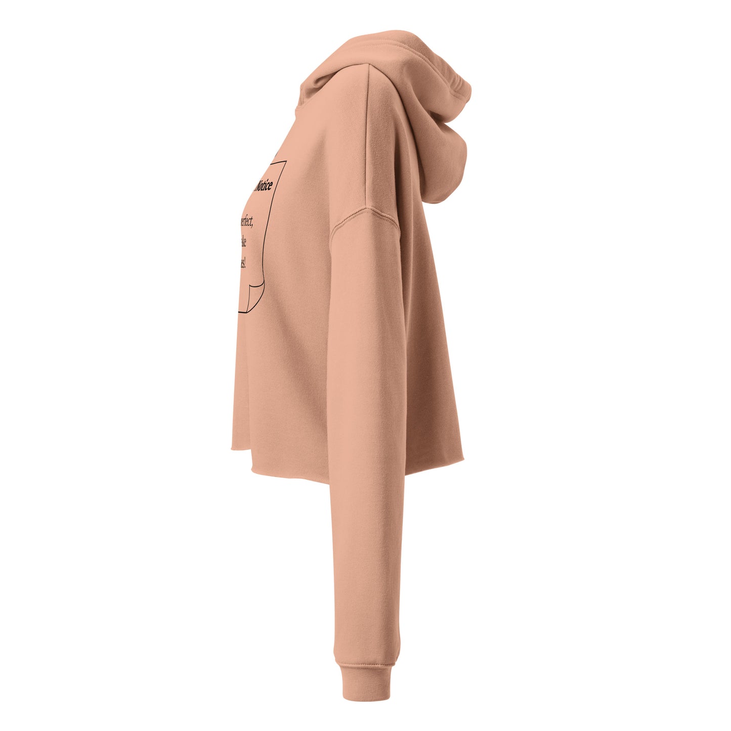 The side view of a woman’s peach hoodie cropped sweatshirt jumper.