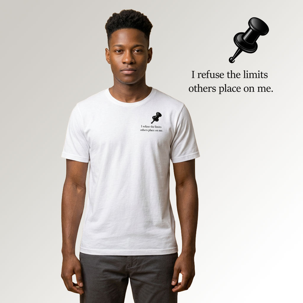 A man in black jeans wearing a white classic cotton t-shirt featuring a black push pin and the slogan: "I refuse the limits that others place on me"
