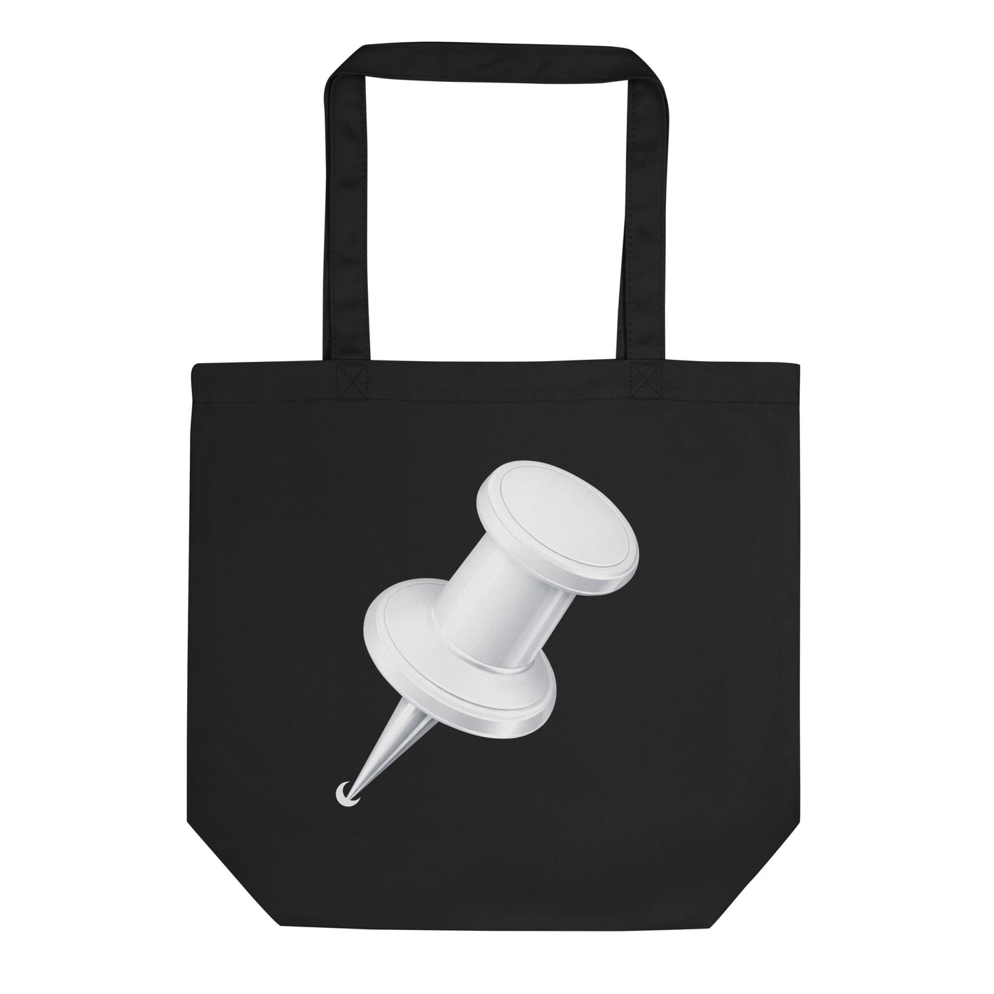 Black organic cotton tote bag featuring a bold white push pin graphic on the front in a minimalist design