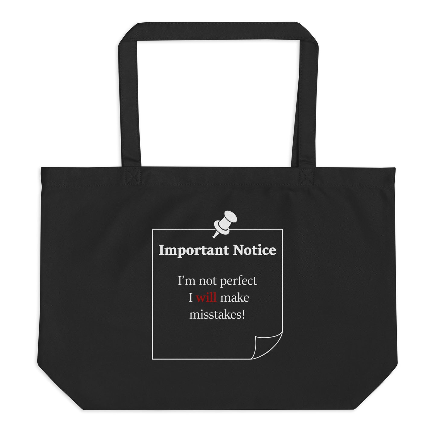 A large organic cotton twill black tote bag featuring a printed white-outlined square note and a white pushpin at the top centre. The note displays the slogan: "Important notice: I’m not perfect, I will make mistakes" in black, with the word will highlighted in bold red for emphasis.