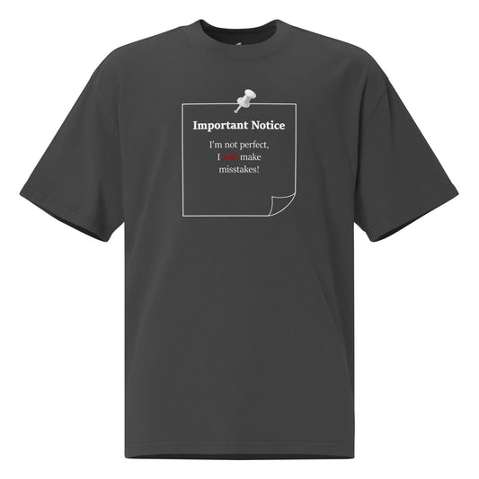 Oversized faded graphic t-shirt with slogan “I’m not perfect I will make mistakes” in minimalist black typography
