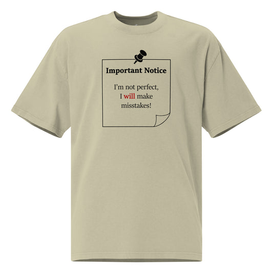 A unisex oversized cotton eucalyptus colour  t-shirt featuring a printed black outlined square note and a black pushpin at the top centre. The note displays the slogan: "Important notice: I’m not perfect, I will make mistakes" in black, with the word will highlighted in bold red for emphasis.