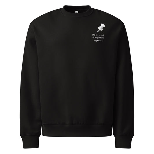Black oversized heavyweight sweatshirt with “My life is just as important as yours” white statement graphic front view