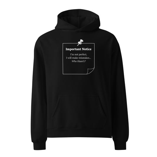 Black oversized heavyweight hoodie featuring “Important Notice: I’m not perfect, I will make mistakes” note graphic design front view