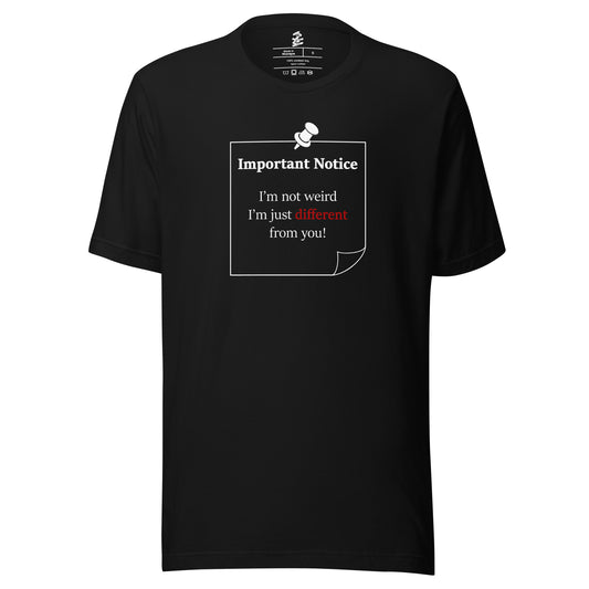 A unisex black classic cotton t-shirt featuring a printed white-outlined square note and a white pushpin at the top centre. The note displays the slogan: "Important notice: I’m not weird i'm just different from you, with the word different highlighted in bold red for emphasis.