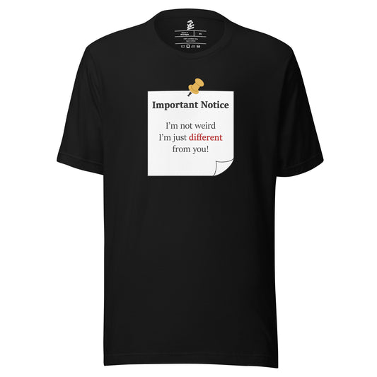 A unisex black classic cotton t-shirt, featuring a printed black-outlined square note with a white background and a yellow pushpin at the top centre. The note displays the slogan: "Important notice: I’m not weird, i'm just different from you! with the word different highlighted in bold red for emphasis. 