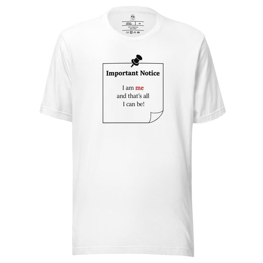 A unisex white classic cotton t-shirt featuring a printed black-outlined square note and a black pushpin at the top centre. The note displays the slogan: "Important notice: I am me and that's all I can be" in black, with the word me highlighted in bold red for emphasis.