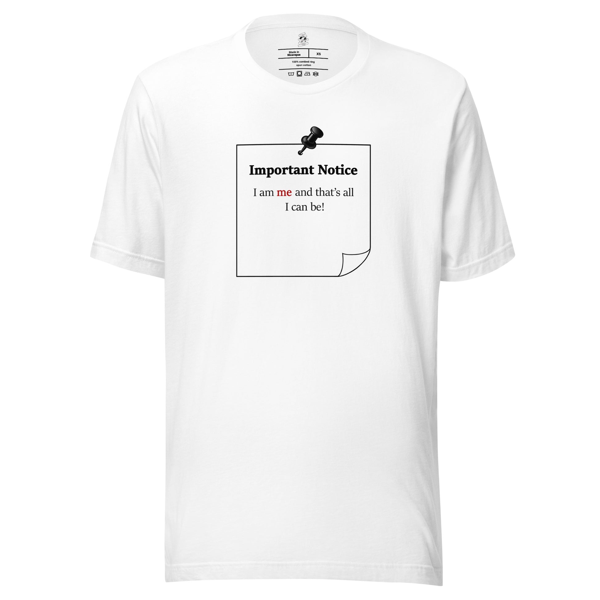 White unisex motivational slogan T-shirt design featuring a pushpin note graphic with the quote “I am me and that is all I can be,” with the word “me” highlighted in red.