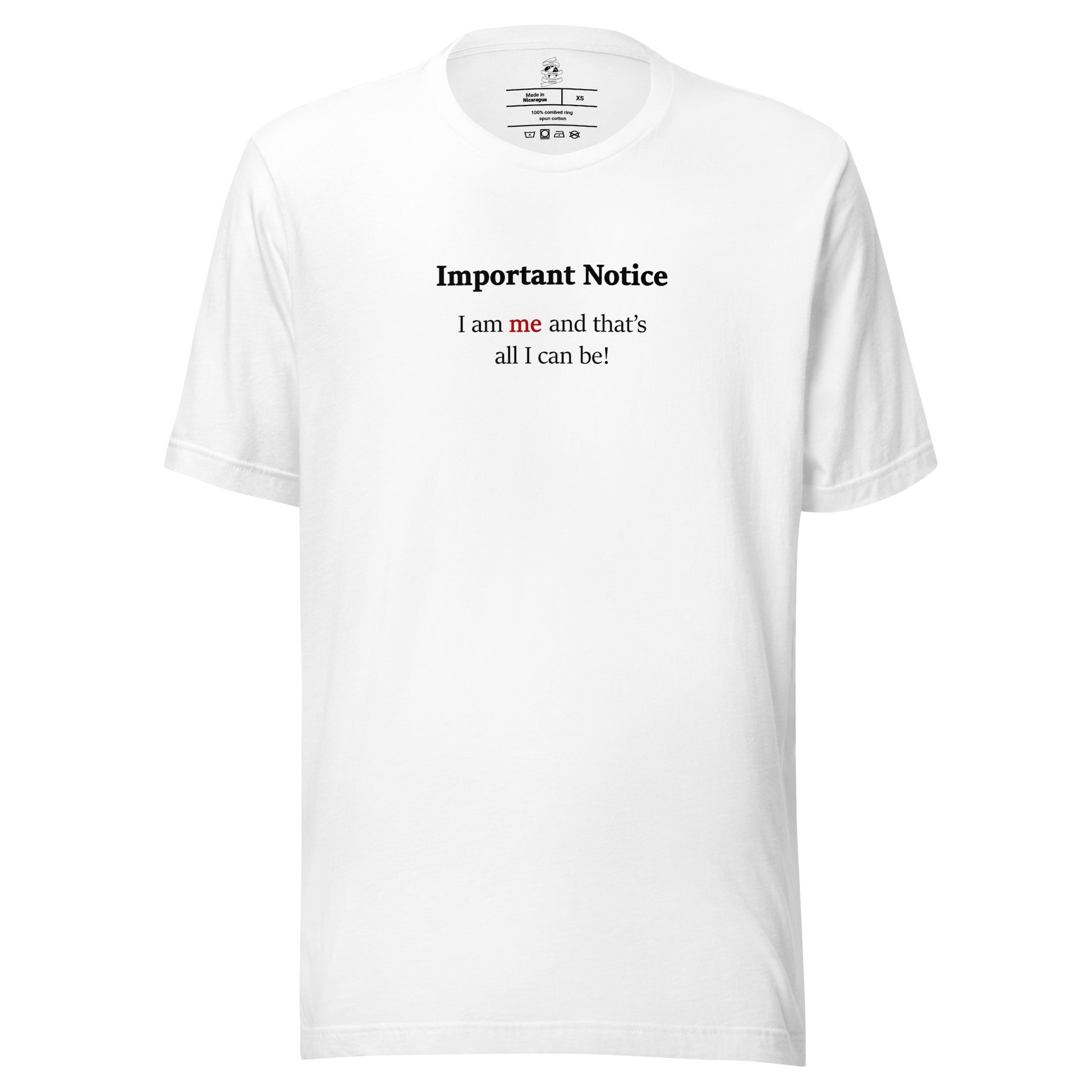 White unisex motivational slogan T-shirt design featuring a pushpin note graphic with the quote “I am me and that is all I can be,” with the word “me” highlighted in red.