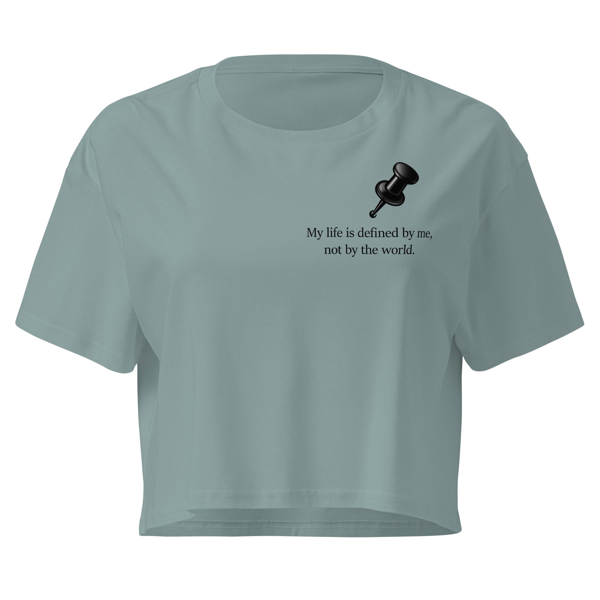 Mineral colour women's crop top featuring a black push pin graphic and the statement “My life is defined by me, not by the world” graphic design 
