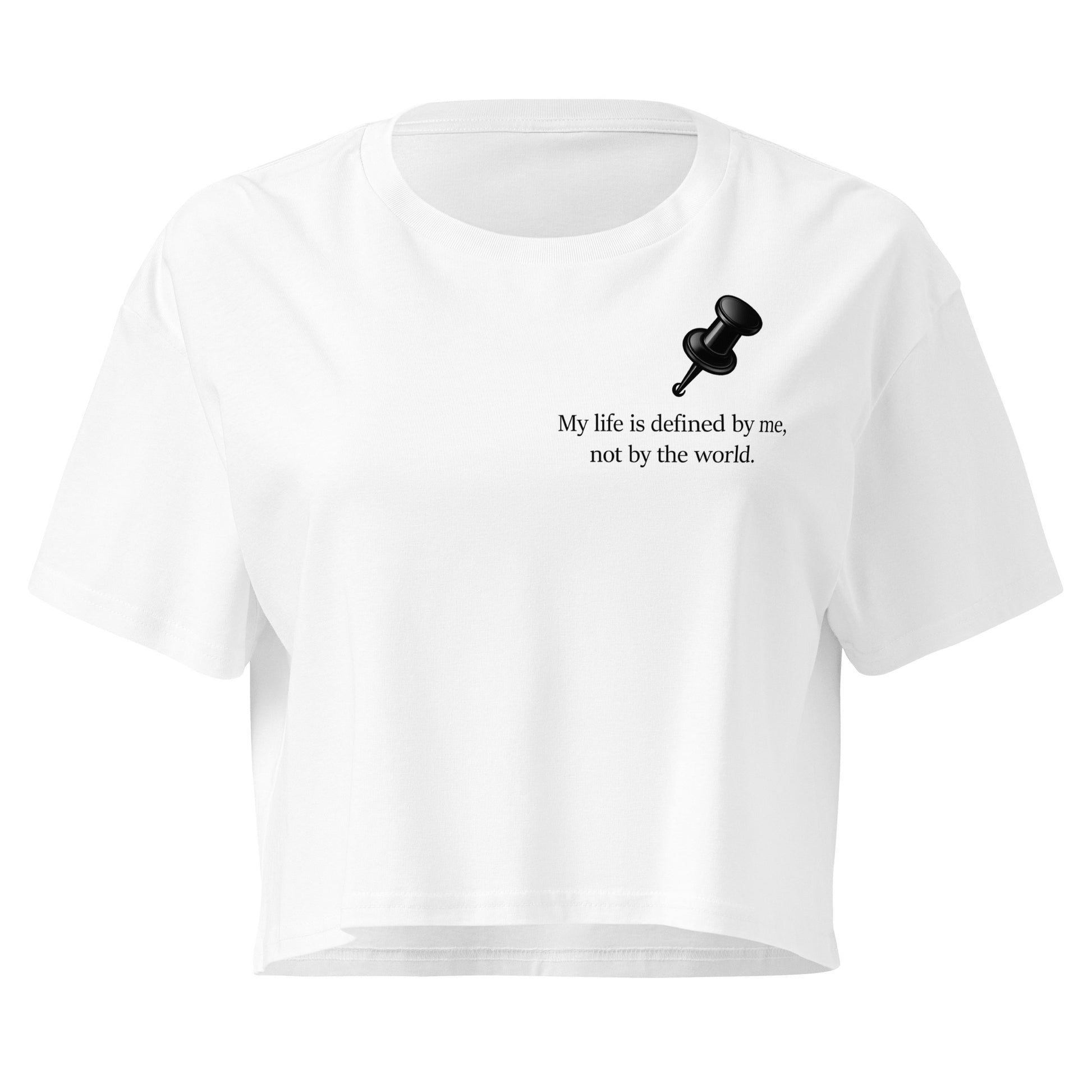 White women's crop top featuring a black push pin graphic and the statement “My life is defined by me, not by the world” graphic design 