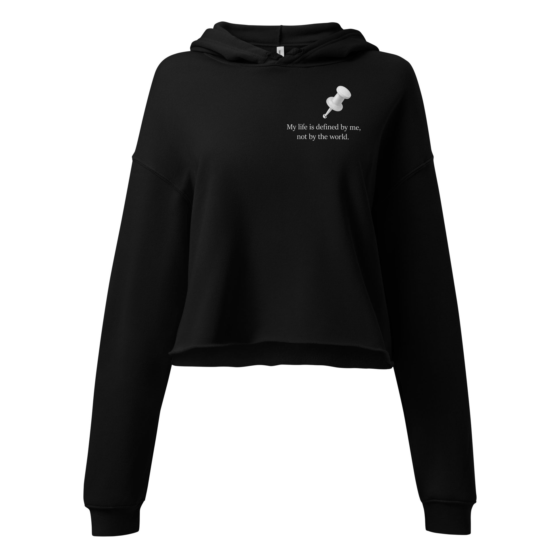 Black cropped hoodie featuring “My life is defined by me, not by the world” statement with a push pin illustration front view.